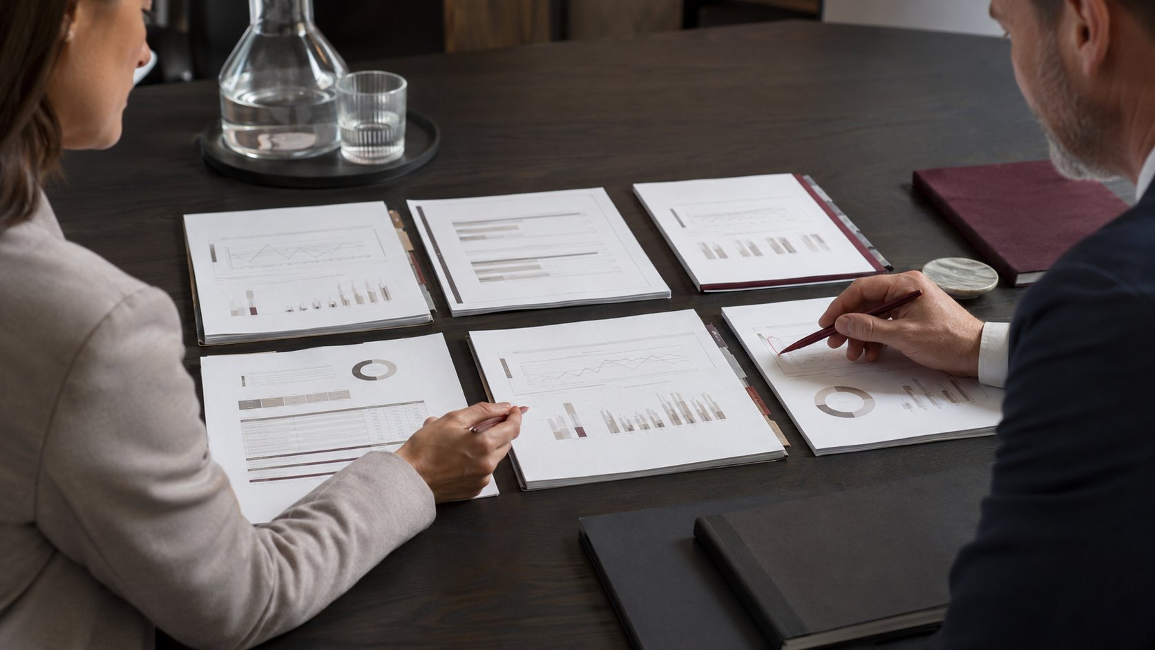 Illustration of trustees reviewing financial charts and reports before an AGM.