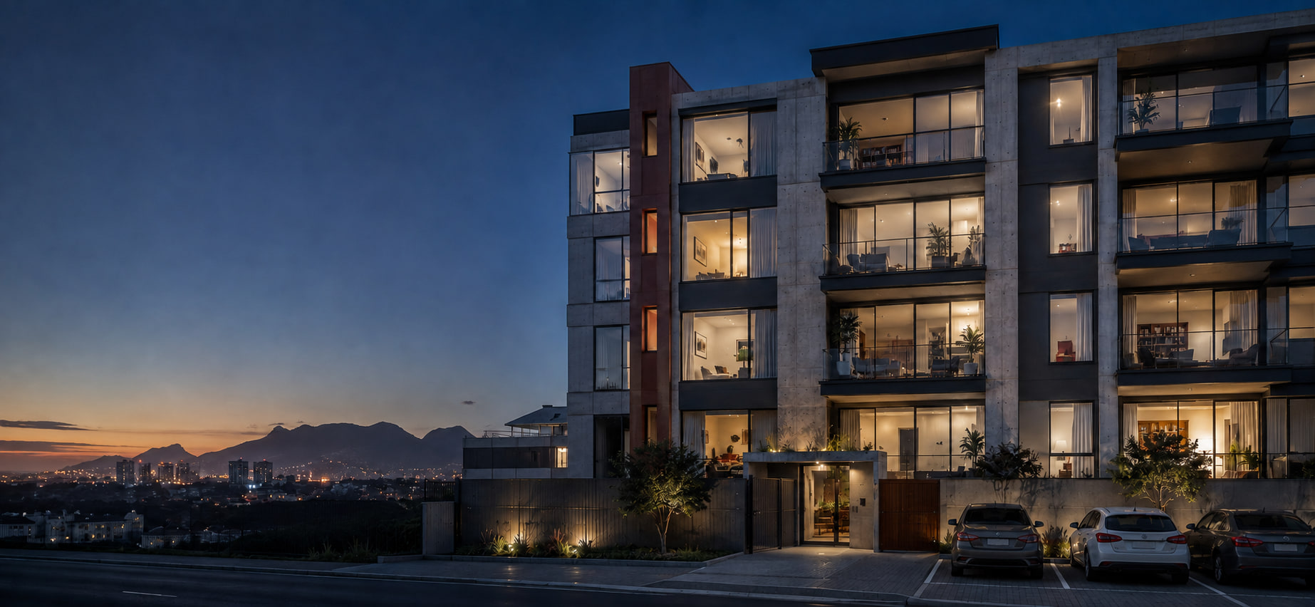 Cape Town sectional-title apartment building at blue hour.